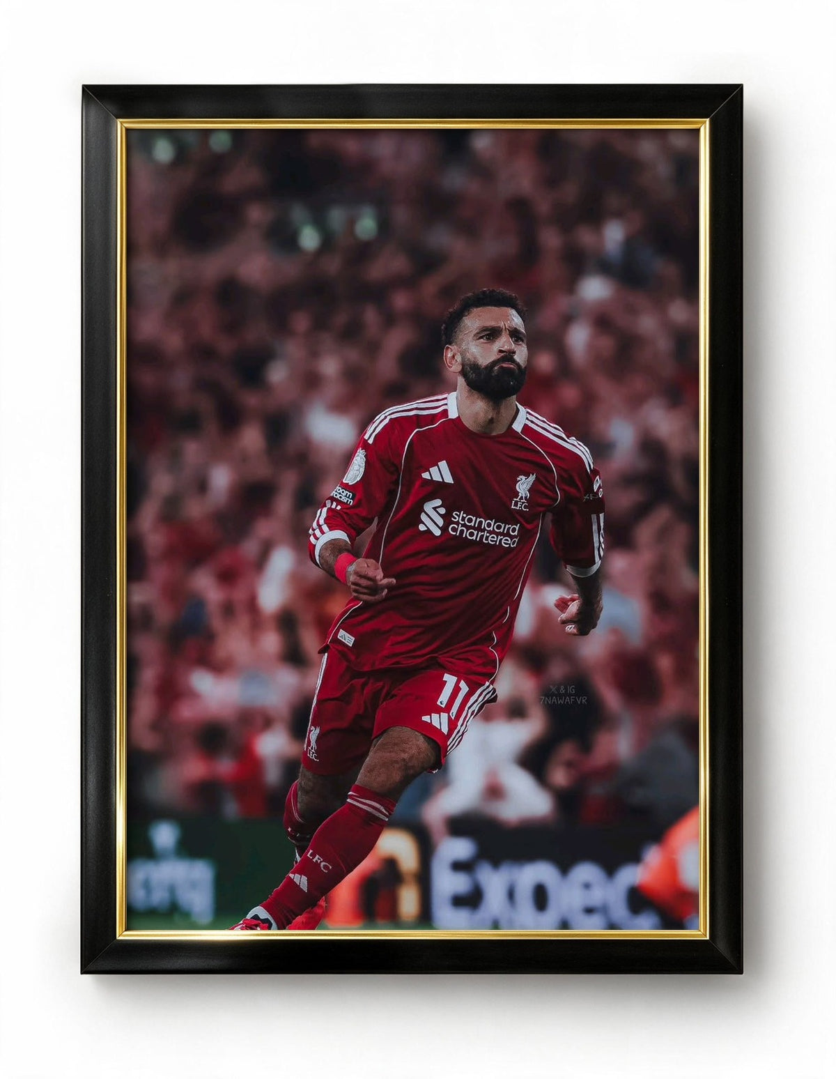 Salah celebrating Frame